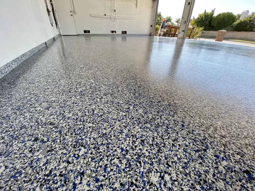 Blue flake epoxy garage floor installation in Twin Falls, Idaho